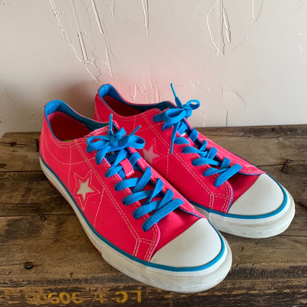 Woman’s 9.5 hot pink and blue Converse All Star
